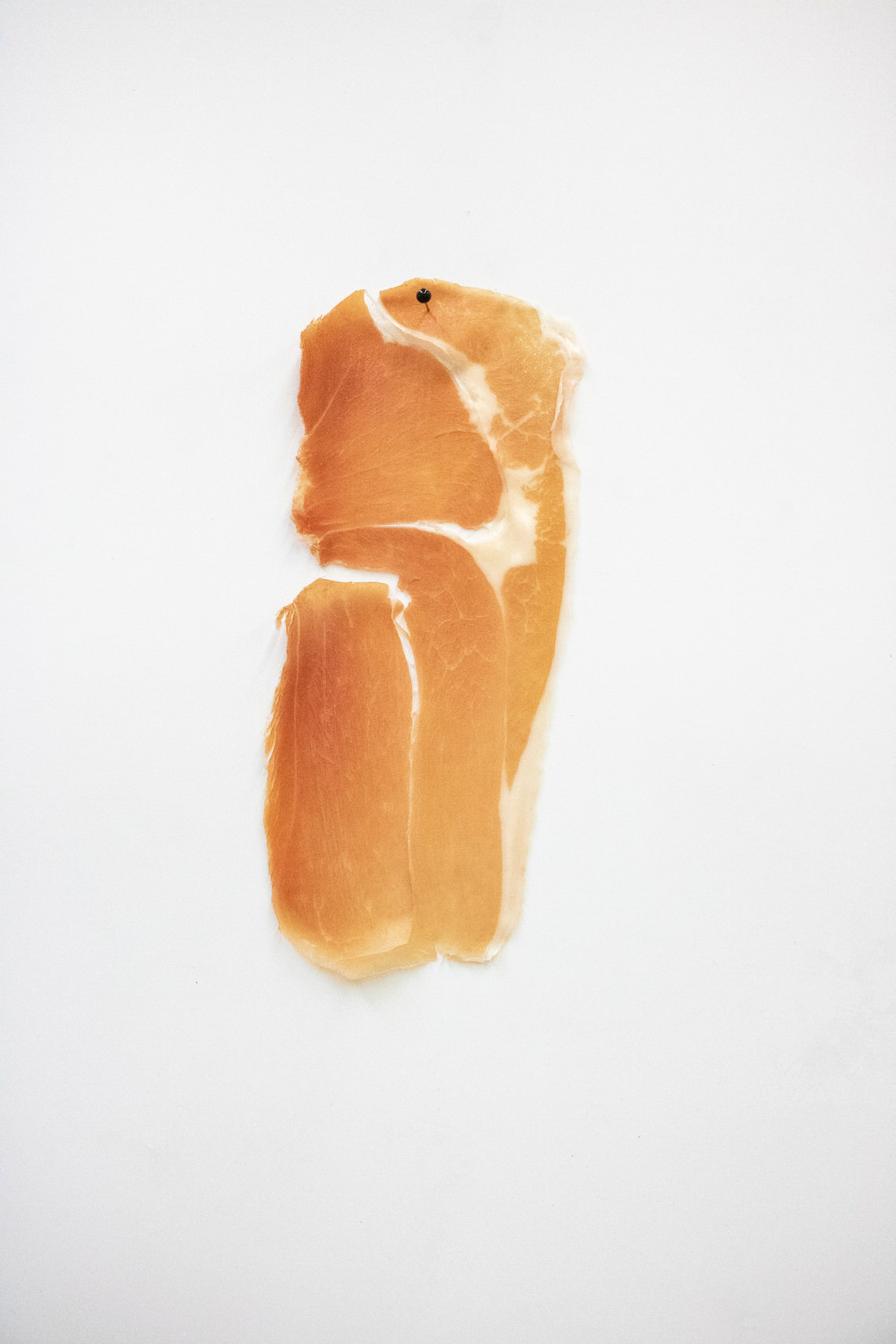  - untitled (prosciutto pinned to the wall slice after slice)