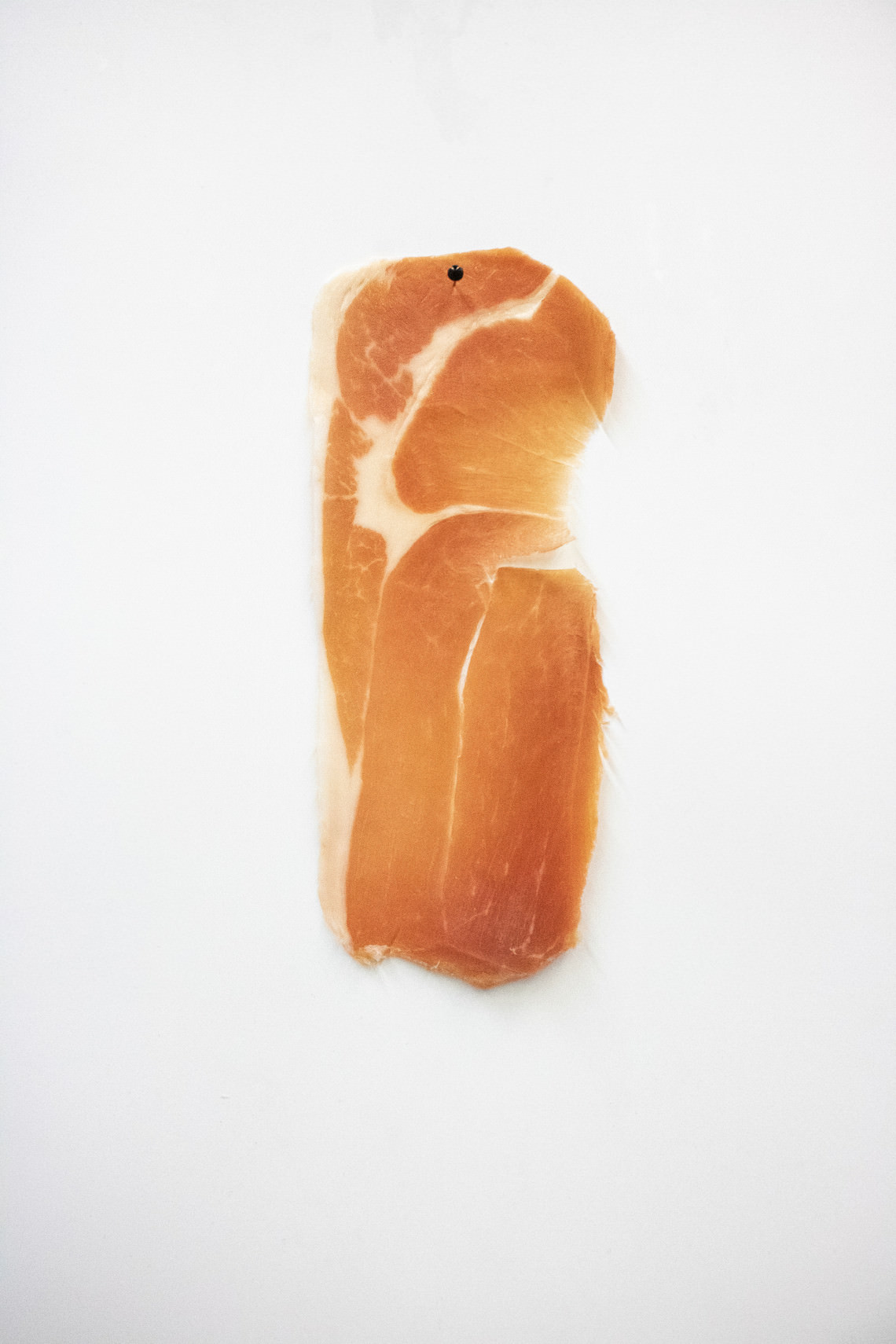  - untitled (prosciutto pinned to the wall slice after slice)