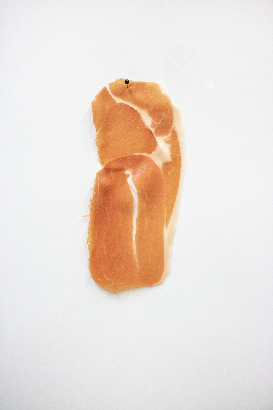  - untitled (prosciutto pinned to the wall slice after slice)