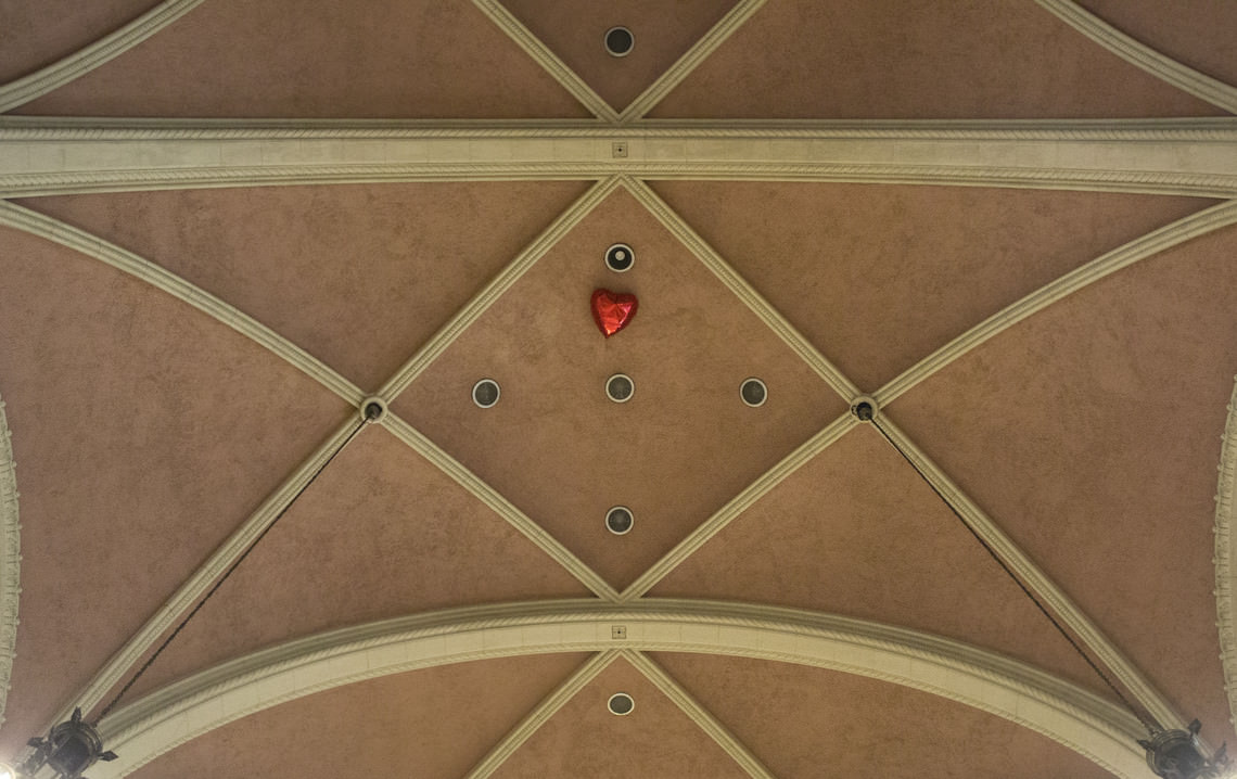  - untitled (a heart-shaped red balloon inflated with helium dropped into a church)